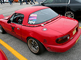 Red NA Mazda Miata with Hard top