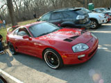 Red Supra with Black Wheels