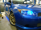 Blue Scion tC with Gold Wheels
