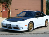 White 240SX with gold wheels