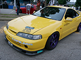 Yellow Acura Integra with JDM front