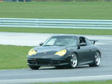 Black Porsche GT3 at the Track