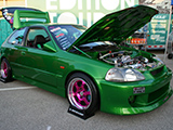 Green Civic with pink wheels
