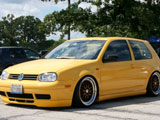 Yellow Volkswagen GTI with Rial Wheels