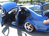 Blue VW Jetta with air suspension
